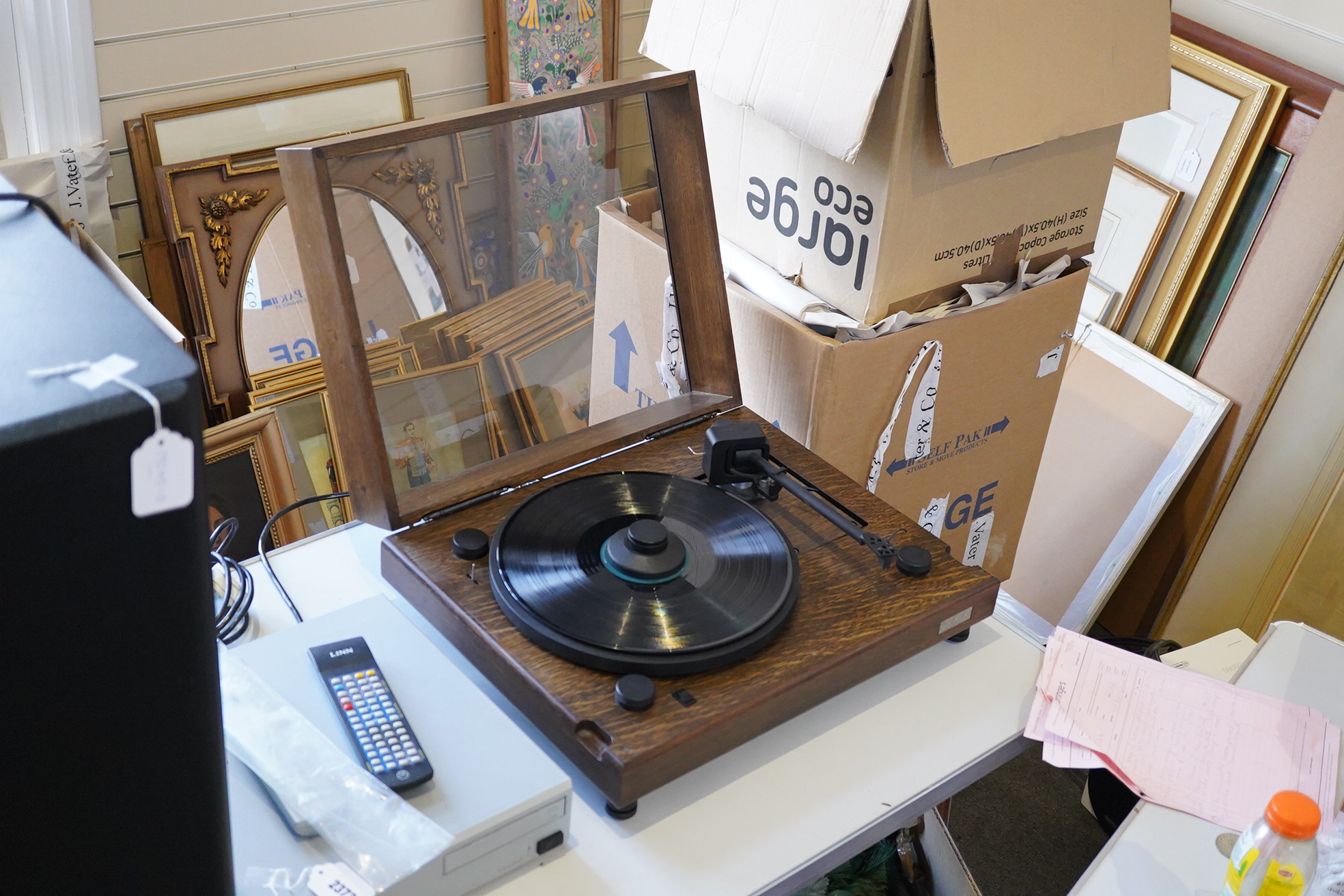 A Kuzma Stabi 2 HiFi turntable record player in a stained oak case